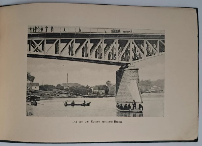 Гродненец купил альбом с фотографиями города, которым исполнилось сто лет