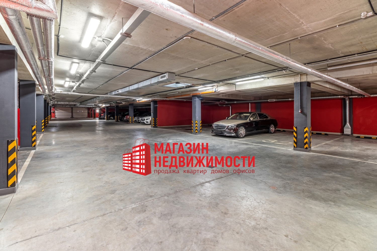 Паркоўка ў падвале дома на вул. Будзёнага 28